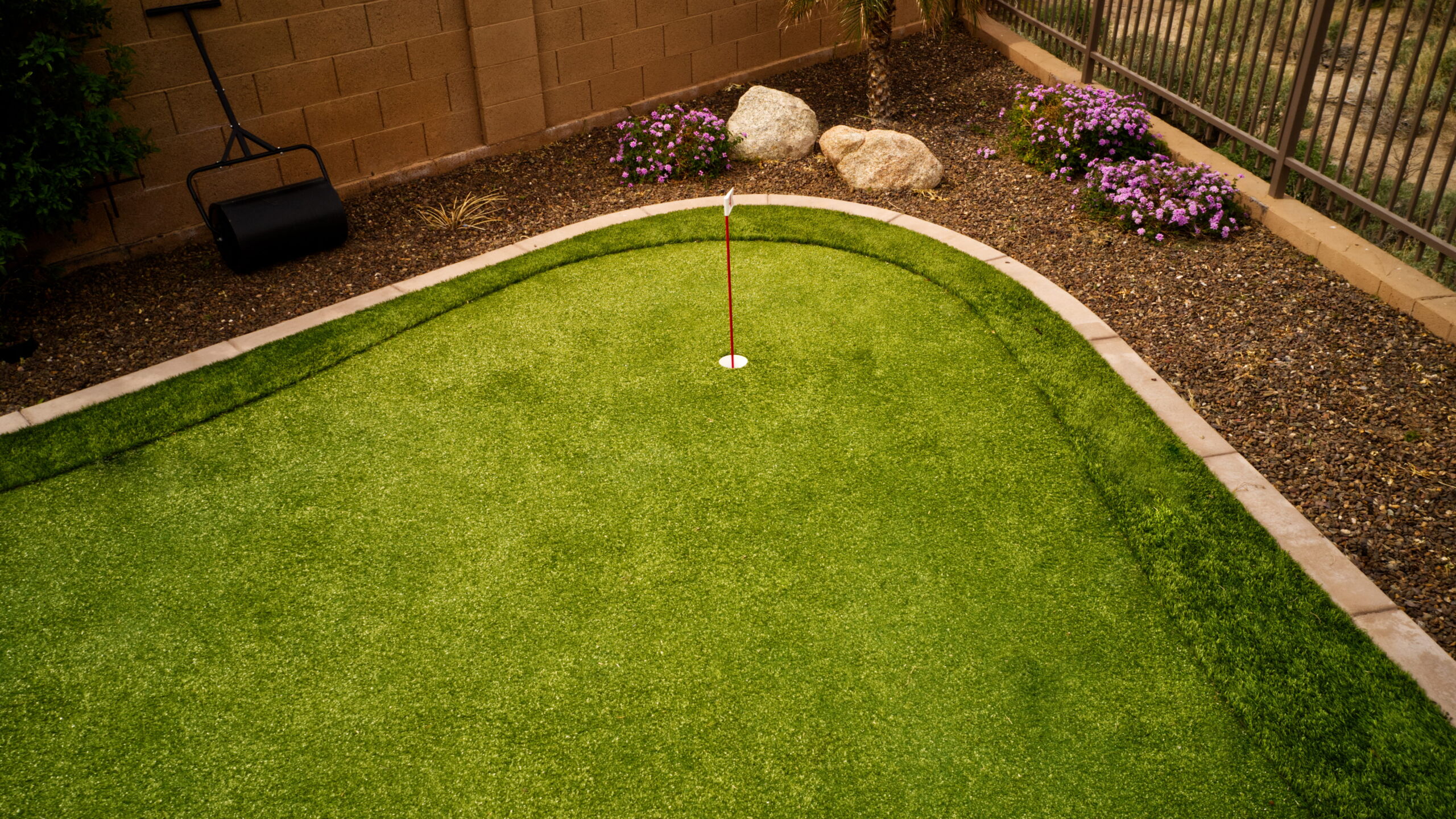 How a Backyard Putting Green Turns Your Colorado Home Into a Year-Round Hangout
